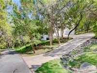 CHARMING HOME NESTLED ON A GORGEOUS TREED LOT