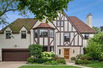 MAGNIFICENT TUDOR HOME WITH BEAUTIFUL BACKYARD OASIS