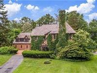 BEAUTIFUL TUDOR IN THE HEART OF PEPPER PIKE WITH EXCEPTIONAL ARCHITECTURAL DETAILS