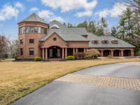 CUSTOM BRICK MANOR HOME ON 8-PLUS ACRES