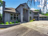 PRIVATE FRENCH-STYLE STUCCO HOME IN MEDFORD