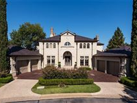 COMMANDING ITALIAN VILLA ON RARE WATERFRONT DOUBLE LOT