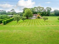 SPACIOUS AND STYLISH HOME ON EXPANSIVE GROUNDS