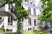 AN EXCLUSIVE CHARMING THREE LEVEL HOME WITH A PRIVATE GARDEN