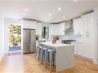 BEAUTIFULLY DESIGNED TWO FAMILY TOWNHOME