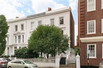 VERY ATTRACTIVE THREE BEDROOM FOUR-STORY HOME