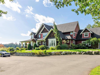 PRIVATE HOME SURROUNDED BY FARMS ON ROLLING TERRAIN