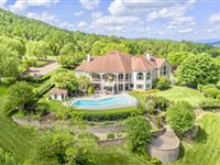 AN EXCEPTIONAL PROPERTY IN GATED ESTATES COMMUNITY