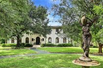 DAVIS HOME SITUATED ON OVER AN ACRE OF BEAUTIFULLY LANDSCAPED GROUNDS