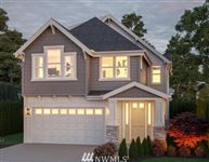 NEWLY DESIGNED HOME WITH AN OPEN AND SPACIOUS FLOOR PLAN