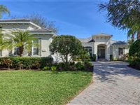PEACEFUL, NATURAL BEAUTY SURROUNDS THIS ELEGANT RESIDENCE BEAMING WITH SOPHISTICATED DESIGN AND FINISHES
