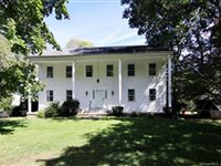 TERRIFIC MID-CENTURY OPPORTUNITY WITH BEAUTIFUL ACREAGE