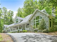 QUALITY CUSTOM HOME WITH BEAUTIFUL WRAP-AROUND PORCH