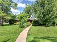 CORNER LOT ON BEAUTIFUL TREE-LINED STREET IN HEDWIG VILLAGE NEIGHBORHOOD