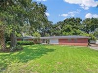 ESTATE-SIZE WOODED LOT BACKING TO PROTECTED LAGOON