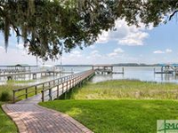 IMMACULATE RIVERFRONT HOME WITH SPECTACULAR SUNSET VIEWS