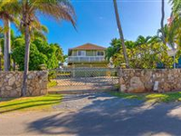 GATED BEACHFRONT PROPERTY WITH TWO HOMES