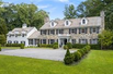 HANDSOME STONE AND CLAPBOARD COLONIAL IN PRIVATE SETTING