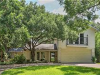 RENOVATED AUSTIN STONE SITS BEAUTIFULLY ON THE HILSIDE