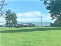 45-PLUS-ACRE EQUINE FACILITY PLUS REMODELED HOME AND GUEST HOUSE