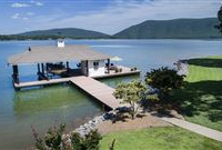 STUNNING LAKEFRONT HOME ON A POINT LOT