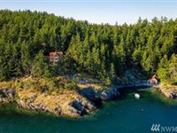 SECLUDED WATERFRONT STONE MANSION
