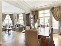 CHARMING APARTMENT IN A FINE TURN-OF-THE-CENTURY HAUSSMANNIAN BUILDING BOASTS PERIOD FEATURES