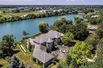 COVETED LAKE FRONTAGE IN GATED LUCKY LAKE