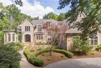 CUSTOM EUROPEAN DESIGNED HOME ON WOODED THREE ACRES