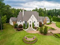 ELEGANTLY DESIGNED FAMILY HOME IN SECLUDED GATED ENCLAVE