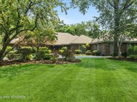 STUNNING BRICK RANCH IN RIVERWOODS