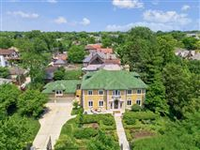 UPDATED STATELY HOME WITH STUNNING CUSTOM MILLWORK AND MOLDING