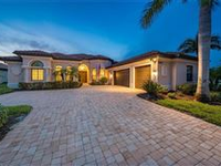 BEAUTIFUL HOME WITH EXPANSIVE LANAI IS A TROPICAL OASIS