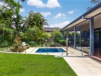 STEP INTO PARADISE WITH THIS FAMILY OASIS