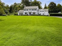 CLASSIC CENTER HALL COLONIAL ON OVER TWO ACRES