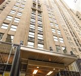STUNNING SOUTHWEST CORNER RESIDENCE AT THE PALMOLIVE BUILDING