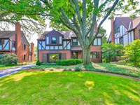 BEAUTIFUL TUDOR REVIVAL ON COVETED CENTER STREET