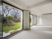 LOVELY APARTMENT WITH A GARDEN BATHED IN SUNSHINE AND ENJOYING A VIEW OF THE EIFFEL TOWER.