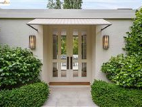 THIS CHIC HOME OFFERS AN EASY FLOOR PLAN AND DRAMATIC SPACES