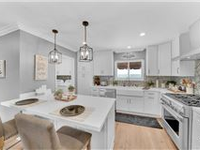 STUNNING REMODELED HOME WITH CUSTOM DESIGNER TOUCHES THROUGHOUT