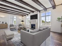 ELEGANT SOUTH EAST CORNER APARTMENT IN THE LEGENDARY 1920S FAUBOURG ST DENIS BLDG