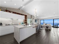 COMPLETELY UPGRADED AND REMODELED HOME WITH PANORAMIC OCEAN VIEWS