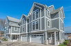 LUXURIOUS CONDOMINIUM WITH SOPHISTICATED DESIGN AND PRIVATE BACKYARD