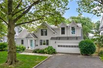 EXPANDED CAPE STYLE HOME IN DESIRABLE LOCATION