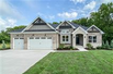 LUXURIOUS DREAM HOME ON SCENIC WOODED ACRE SITE