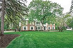 STUNNING COLONIAL ON PICTURESQUE AND PRIVATE LOT