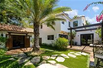 SPANISH-STYLE HOME TASTEFULLY REMODELED WITH TOP-QUALITY FINISHES