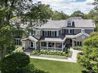EXQUISITE NEWER CONSTRUCTION HOME SITUATED ON A SUNNY CORNER LOT