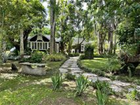IMPECCABLY RESTORED 3 ACRE FARMHOUSE