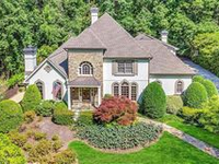 SECLUDED IMMACULATE HOME WITH LAGOON STYLE POOL AND SPA
